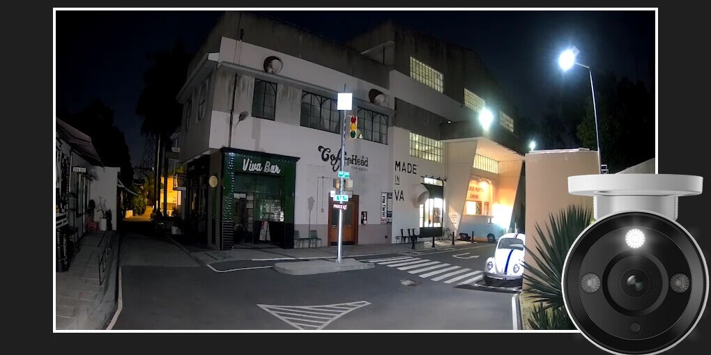 Actual spotlight night footage: a street in full color